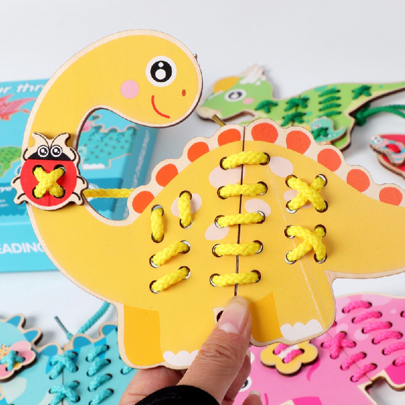 Tableros para ensartar con dinosaurios
