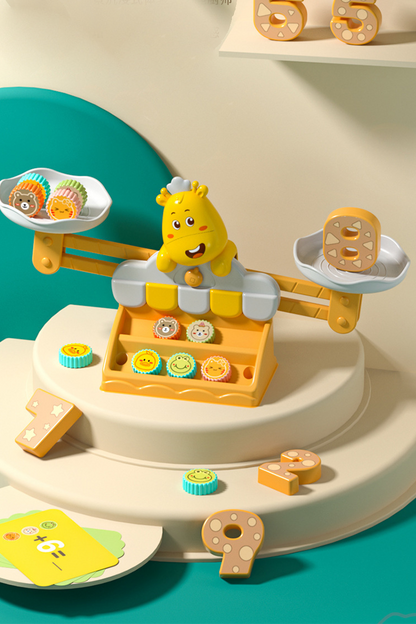 Giraffe Learning Balancing Scale