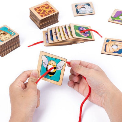 Jeu de correspondance en bois avec des ombres d'animaux de dessins animés pour enfants