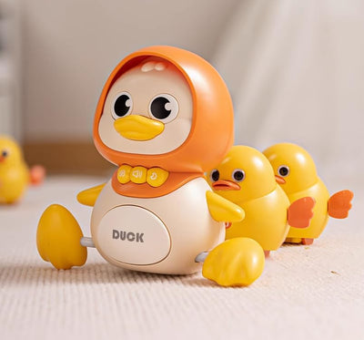 Fidtoy Jouet musical en forme de canard pour bébé avec son et lumière, idéal pour apprendre à ramper