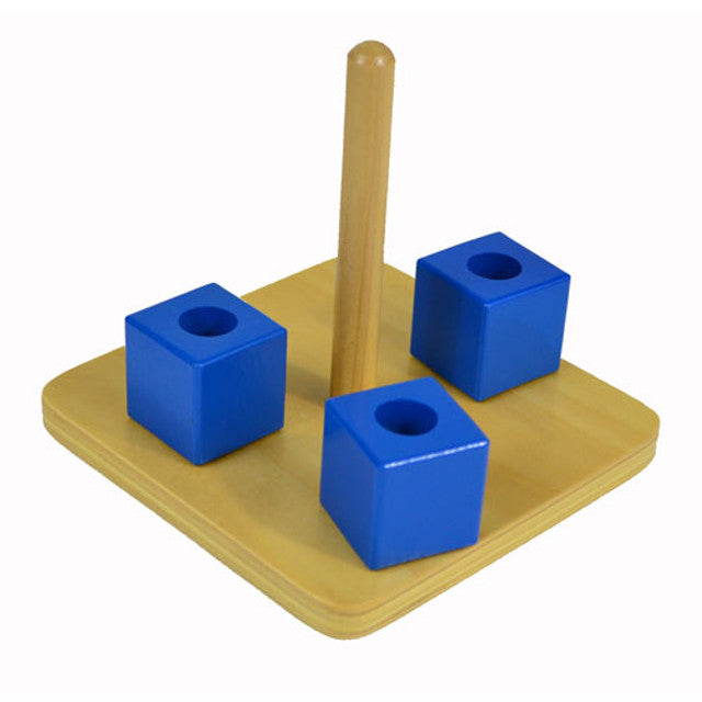 Cubes sur une cheville verticale