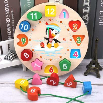 Reloj pingüino Montessori