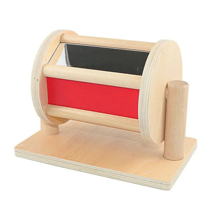 Rotating drum with mirror and ball inside