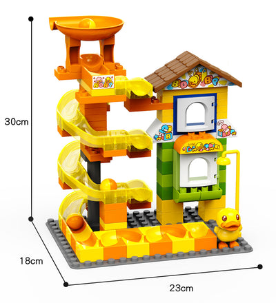 Juego de pistas de canicas con pato amarillo