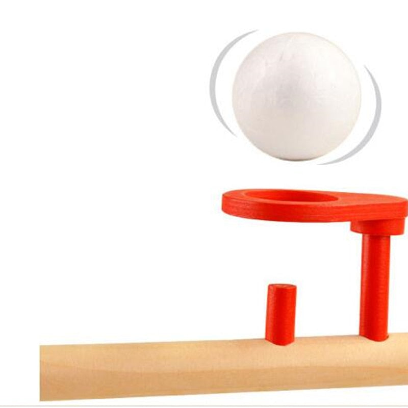 Wooden blowing ball game