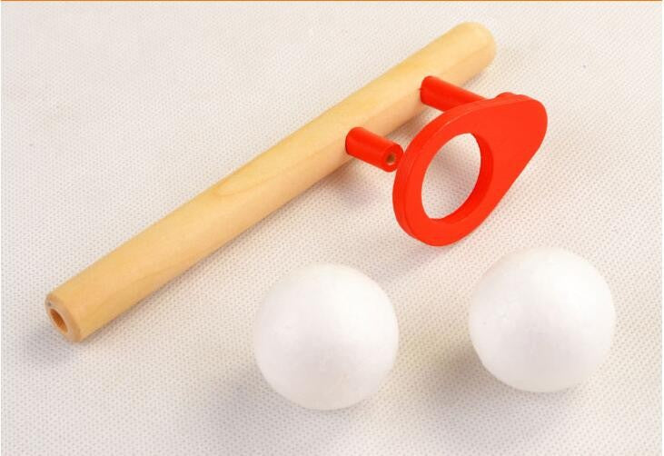 Wooden blowing ball game