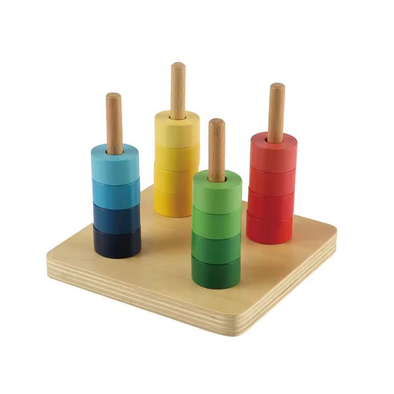 Montessori Rainbow Discs on Four Vertical Dowels