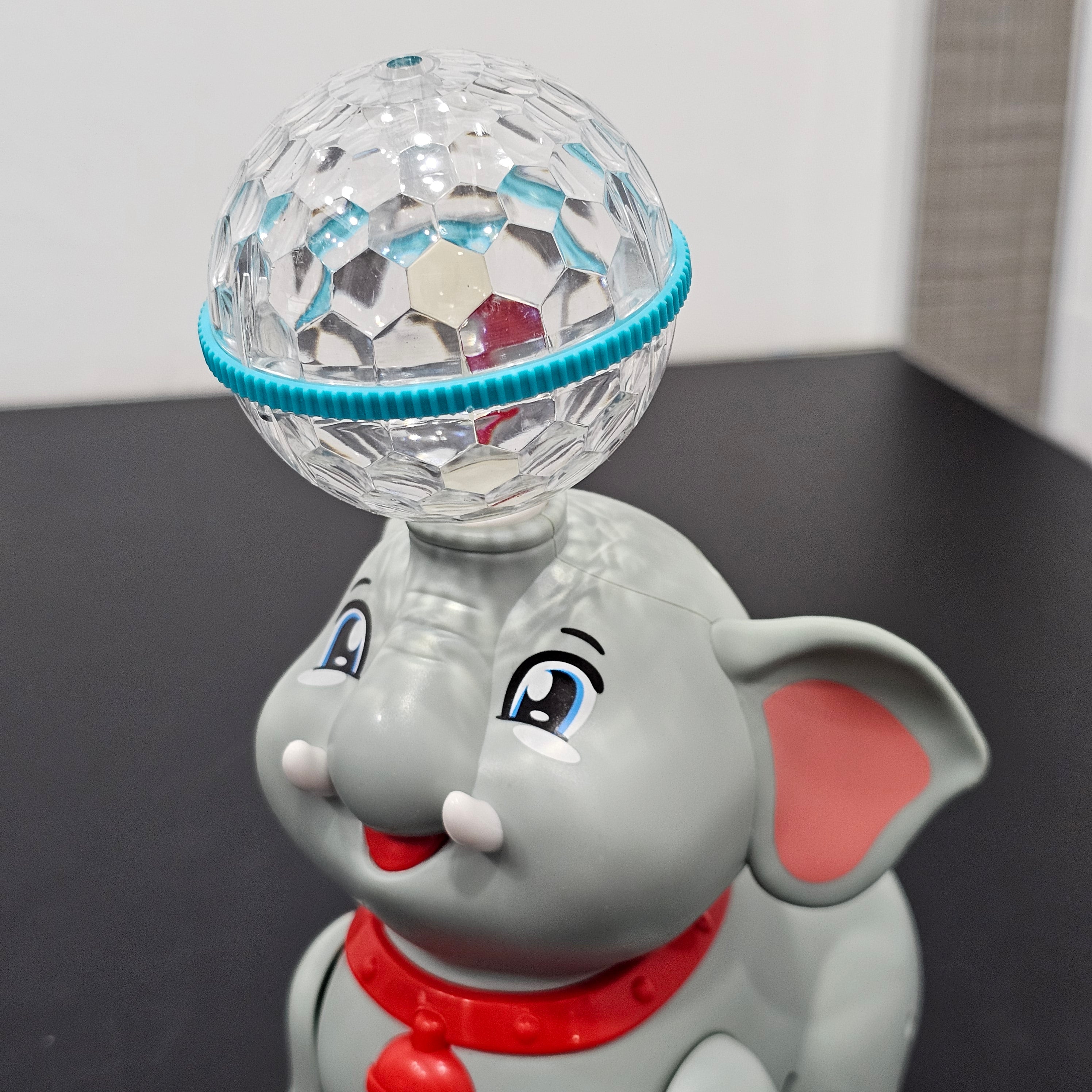 Cute Elephant 360° Rotating Toy – Musical & Light Fun for Kids | Bacha Toys