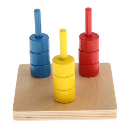Montessori Colour Discs On Three Vertical Dowels